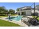 Inviting backyard pool and spa area with lounge chairs, perfect for outdoor relaxation and entertainment at 7641 Fairfax Dr, Kissimmee, FL 34747