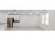 Bright kitchen featuring stainless steel appliances, white cabinets, granite countertops and tile floors at 8651 Sw 138Th St # 68, Ocala, FL 34473