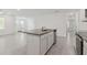 Granite kitchen island with stainless steel sink and dishwasher at 8651 Sw 138Th St # 68, Ocala, FL 34473