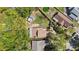 Aerial view of a home featuring a greenhouse and storage shed at 9939 Triple Crown Cir, Orlando, FL 32825