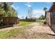 Backyard with both brick and patio areas, enclosed shed; great potential for entertainment at 9939 Triple Crown Cir, Orlando, FL 32825