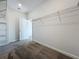 Spacious walk-in closet with wire shelving, offering ample storage and organization solutions at 10018 Halesia Woods Dr, Orlando, FL 32832