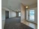 Inviting living room features neutral walls, modern ceiling fan and tile flooring at entrance at 110 Evergreen Dr, Auburndale, FL 33823