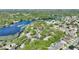 Beautiful aerial view of lakefront community surrounded by lush greenery and serene waters at 1178 Vineland Pl, Lake Mary, FL 32746