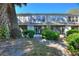 The townhome has a charming yard area with mature landscaping and ample privacy at 1178 Vineland Pl, Lake Mary, FL 32746