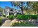 View of a townhome's backyard area with lush landscaping and privacy at 1178 Vineland Pl, Lake Mary, FL 32746