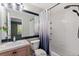 Bright bathroom with shower-tub combo and elegant vanity at 1178 Vineland Pl, Lake Mary, FL 32746