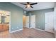Spacious bedroom features ensuite bath and ceiling fan at 1178 Vineland Pl, Lake Mary, FL 32746
