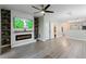 Beautiful open-concept living area features a fireplace and updated fixtures at 1178 Vineland Pl, Lake Mary, FL 32746