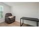 Cozy den with wood-look floors, perfect for relaxation or a home office at 1208 Bonaire Dr, Leesburg, FL 34748