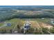 Vast property with a home and unique pool, set amidst green fields and woodlands at 12323 Sweet Hill Rd, Polk City, FL 33868