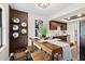 Stylish dining area with modern decor and a butcher-block dining table set for dinner at 124 Oakridge Ave, Edgewater, FL 32132