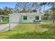 Charming home with fenced yard and attached garage at 124 Oakridge Ave, Edgewater, FL 32132