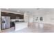 The kitchen features stainless steel appliances, granite countertops, and a breakfast bar at 13687 Sw 33Rd Cir, Ocala, FL 34473