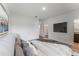 The spacious main bedroom boasts neutral walls, tile flooring, walk-in closet, and en-suite bathroom at 13687 Sw 33Rd Cir, Ocala, FL 34473