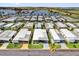 Community aerial view of the homes, with waterfront views of the beautiful lake at 1401 W Highway 50 # 45, Clermont, FL 34711
