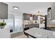 Kitchen with stainless appliances, ample storage, and bar seating at the island at 1401 W Highway 50 # 45, Clermont, FL 34711