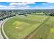 Community park aerial featuring playground and walking paths for a healthy outdoor lifestyle at 15580 Blackbead St, Winter Garden, FL 34787