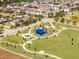 Aerial view featuring neighborhood park with walking path and playground at 15580 Blackbead St, Winter Garden, FL 34787
