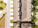 An aerial view of contemporary townhomes with private patios and gardens, in a well-planned community at 15580 Blackbead St, Winter Garden, FL 34787