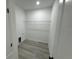 Walk in closet with gray floor and white walls with one shelf for storage at 16947 Sw 22Nd Terrace Rd, Ocala, FL 34473