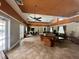 Spacious clubhouse with ample seating, ceiling fans, and natural light, ideal for gatherings at 1968 Compass Flower Way, Ocoee, FL 34761