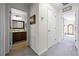 Hallway showcasing access to the bathroom and bedroom at 1968 Compass Flower Way, Ocoee, FL 34761