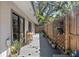 Charming back deck with a wooden fence and an outdoor seating area, perfect for entertaining at 204 Smokerise Blvd, Longwood, FL 32779