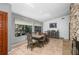 Dining room with tile flooring, fireplace, and natural light at 204 Smokerise Blvd, Longwood, FL 32779