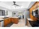 Bright kitchen featuring stainless steel appliances, tile flooring, and a dining area at 204 Smokerise Blvd, Longwood, FL 32779