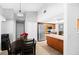 Open kitchen layout with stainless steel appliances and adjacent dining area at 204 Smokerise Blvd, Longwood, FL 32779