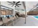 Inviting outdoor living space with ceiling fans, and sliding glass doors overlooking the pool at 204 Smokerise Blvd, Longwood, FL 32779