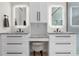 Bathroom featuring double sinks, granite countertops, and modern fixtures at 2058 Washington Ave, Sanford, FL 32771