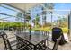 Relax in style under the screened patio, with the pool just a few feet away at 229 Troon Cir, Davenport, FL 33897