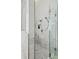 The tiled glass shower features dual shower heads and a built in storage space at 2501 Hinsdale Dr, Kissimmee, FL 34741