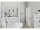 Close up on the soaking tub and glass enclosed shower with tiled walls and floor at 2501 Hinsdale Dr, Kissimmee, FL 34741