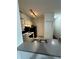 Functional kitchen featuring modern lighting, ample cabinet space, and stainless steel sink at 2717 Maitland Crossing Way # 4-103, Orlando, FL 32810