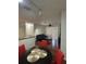 Living room featuring hardwood flooring, ceiling fan, and an open floorplan at 2717 Maitland Crossing Way # 4-103, Orlando, FL 32810