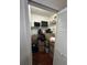 Walk-in closet with shelving, filled with boxes and items for storage at 2717 Maitland Crossing Way # 4-103, Orlando, FL 32810