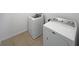 Laundry room with white washer and dryer units at 3056 Sangria St, Kissimmee, FL 34744