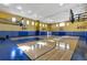 Community recreation area features a clean basketball court with multiple hoops and a hardwood surface at 3398 Greenwich Village Blvd # 104, Orlando, FL 32835
