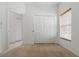 Bright bedroom featuring neutral carpet, large closet and natural light from a window at 3747 Moon Dancer Pl, St Cloud, FL 34772