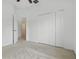 Bedroom featuring a ceiling fan and a closet with folding doors at 3747 Moon Dancer Pl, St Cloud, FL 34772