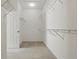 Walk-in closet featuring built-in shelving for optimal storage at 3747 Moon Dancer Pl, St Cloud, FL 34772