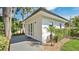 Modern detached home with gray decking and natural landscaping at 409 W 2Nd Ave, Windermere, FL 34786