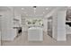 Bright kitchen features a large center island, modern appliances, and plenty of cabinet space at 409 W 2Nd Ave, Windermere, FL 34786