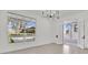 Bright living room with large window and access to outdoor area at 409 W 2Nd Ave, Windermere, FL 34786