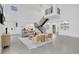 Spacious living room featuring high ceilings, an open floor plan, and a modern staircase at 409 W 2Nd Ave, Windermere, FL 34786