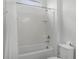 A clean and well-maintained bathroom with shower and tub at 418 Marcello Blvd, Kissimmee, FL 34746