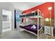 Unique ' bedroom with bunk beds, accent wall, and decor creating a fun and playful atmosphere at 418 Marcello Blvd, Kissimmee, FL 34746